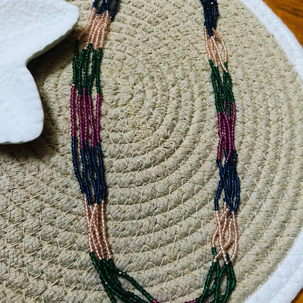 Beaded necklace with green and pink beads