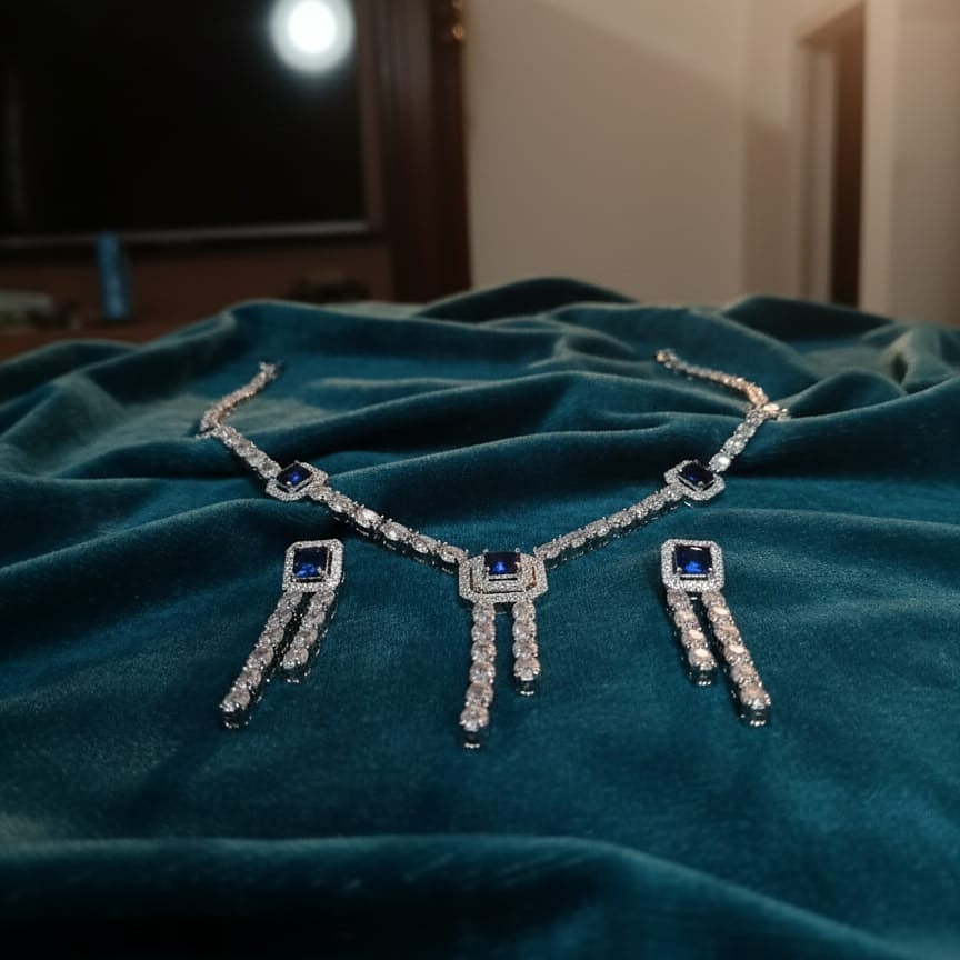 Diamond necklace with blue gemstones