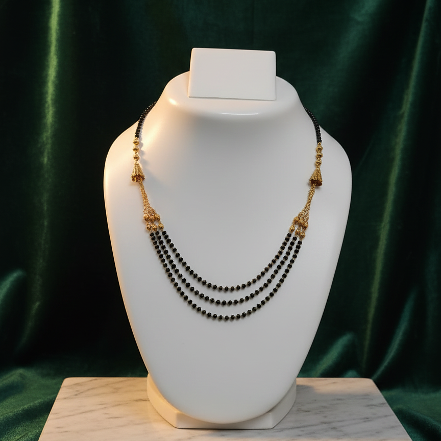 Traditional Gold and Black Beaded Necklace