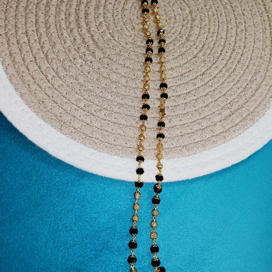 Gold and black beaded necklace