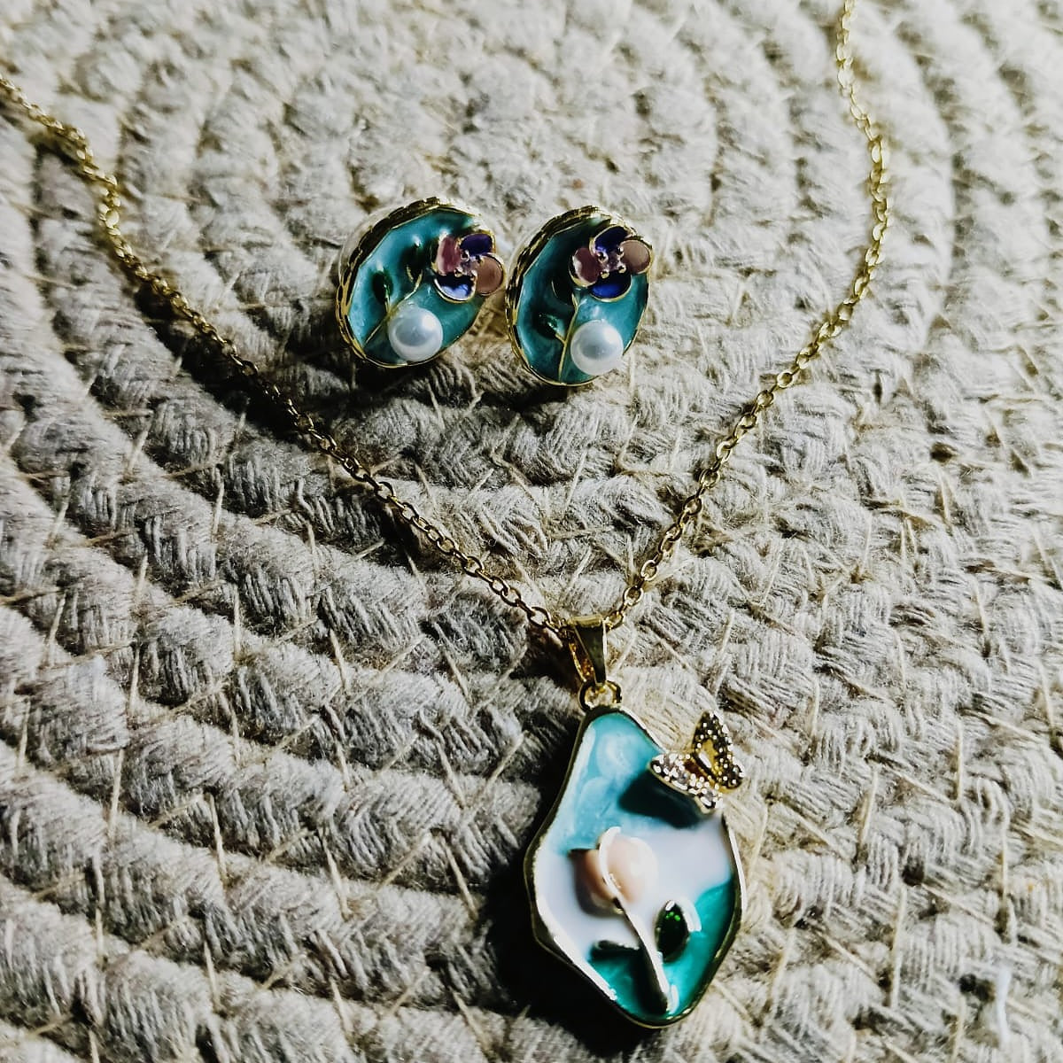 Gold ring with a green gemstone