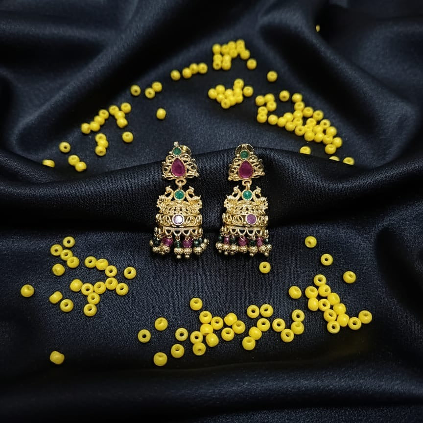 Gold earrings with red and green stones