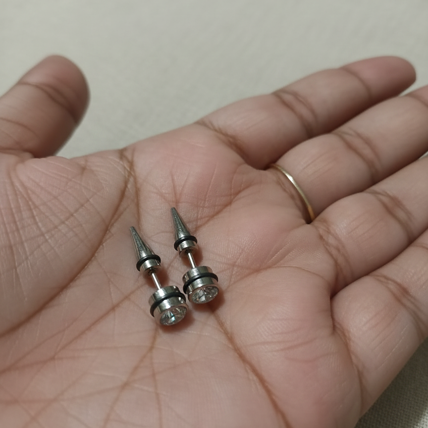 Two metallic spike earrings