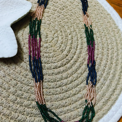 Beaded necklace with green and pink beads