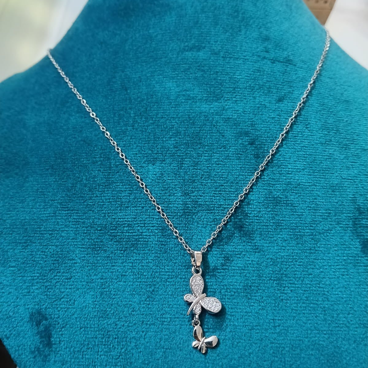 Silver necklace with a butterfly pendant 