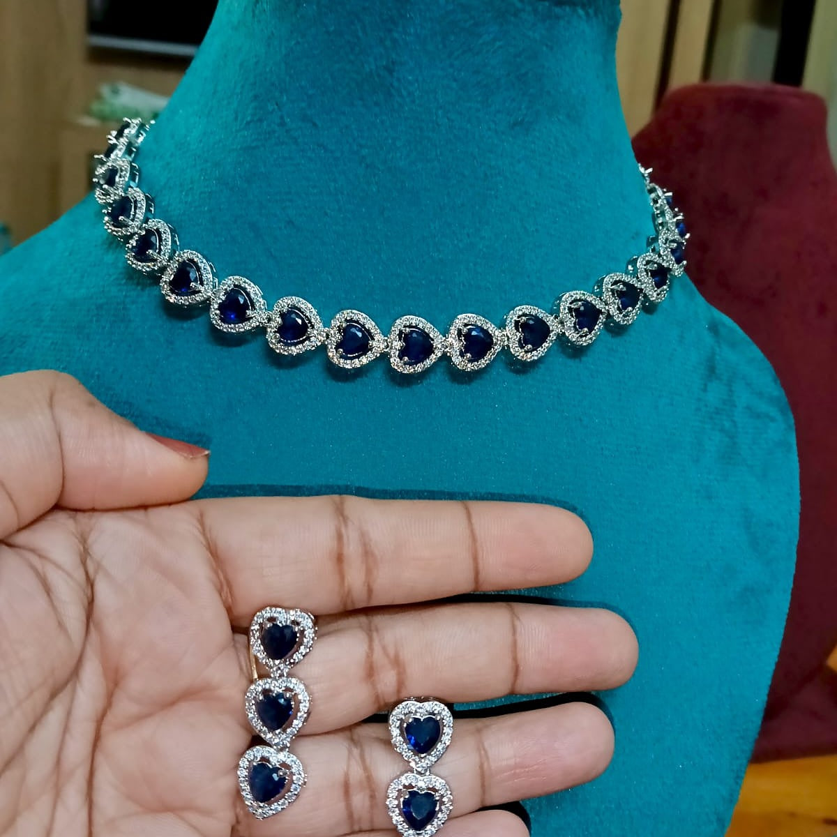 Necklace and earrings with blue gemstones