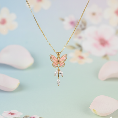 Butterfly-shaped pendant necklace on a light blue background with floral elements