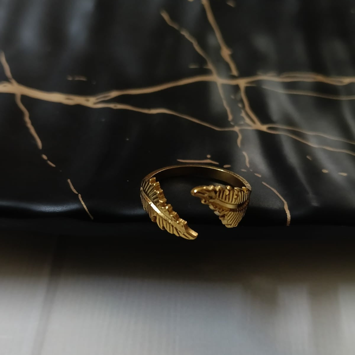 Gold wing-shaped ring 