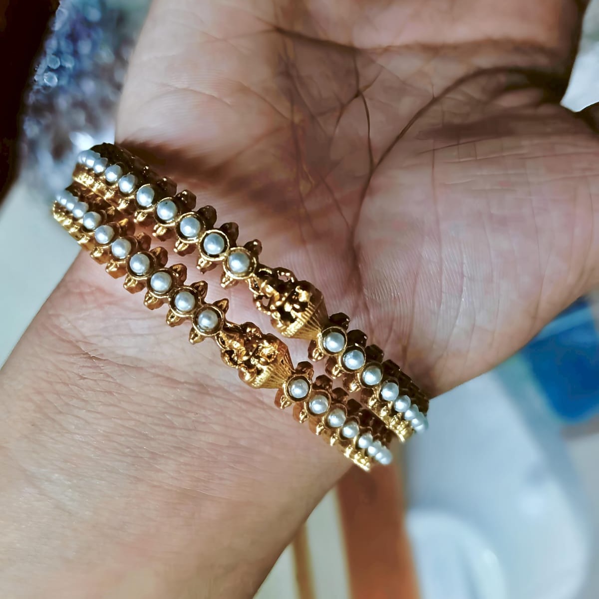 Gold and pearl bangles