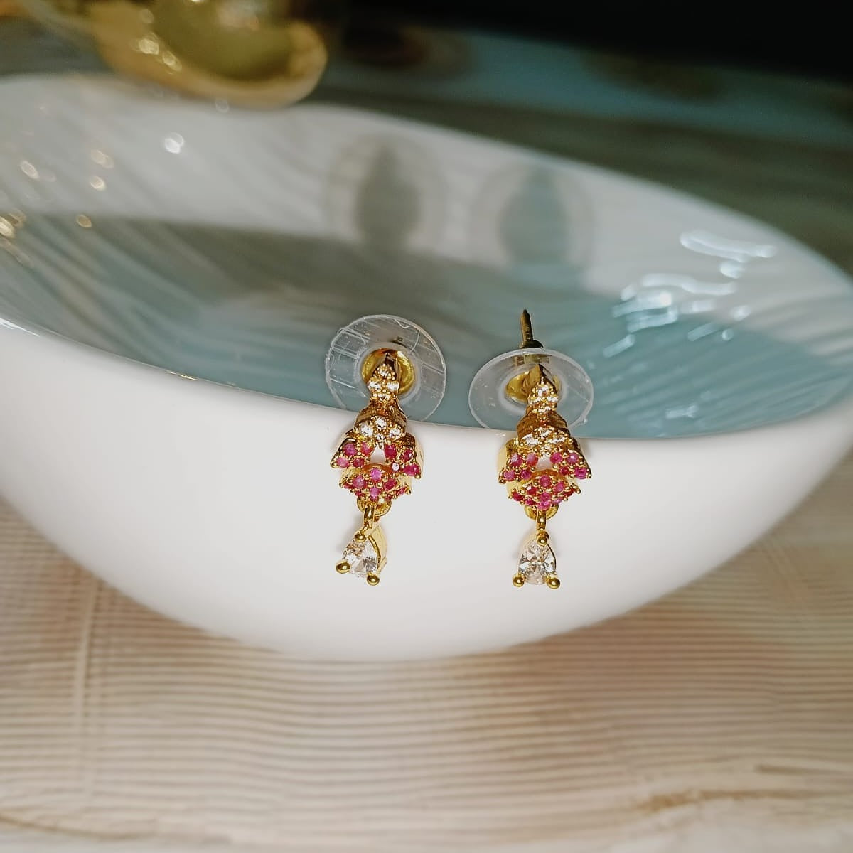 Gold and pink earrings