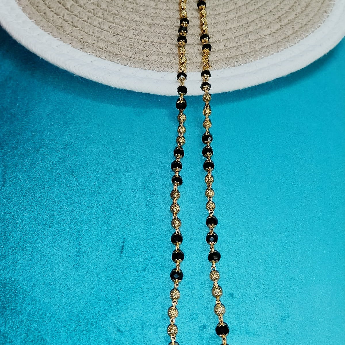 Gold and black beaded necklace
