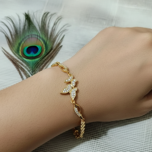 Gold bracelet on a wrist