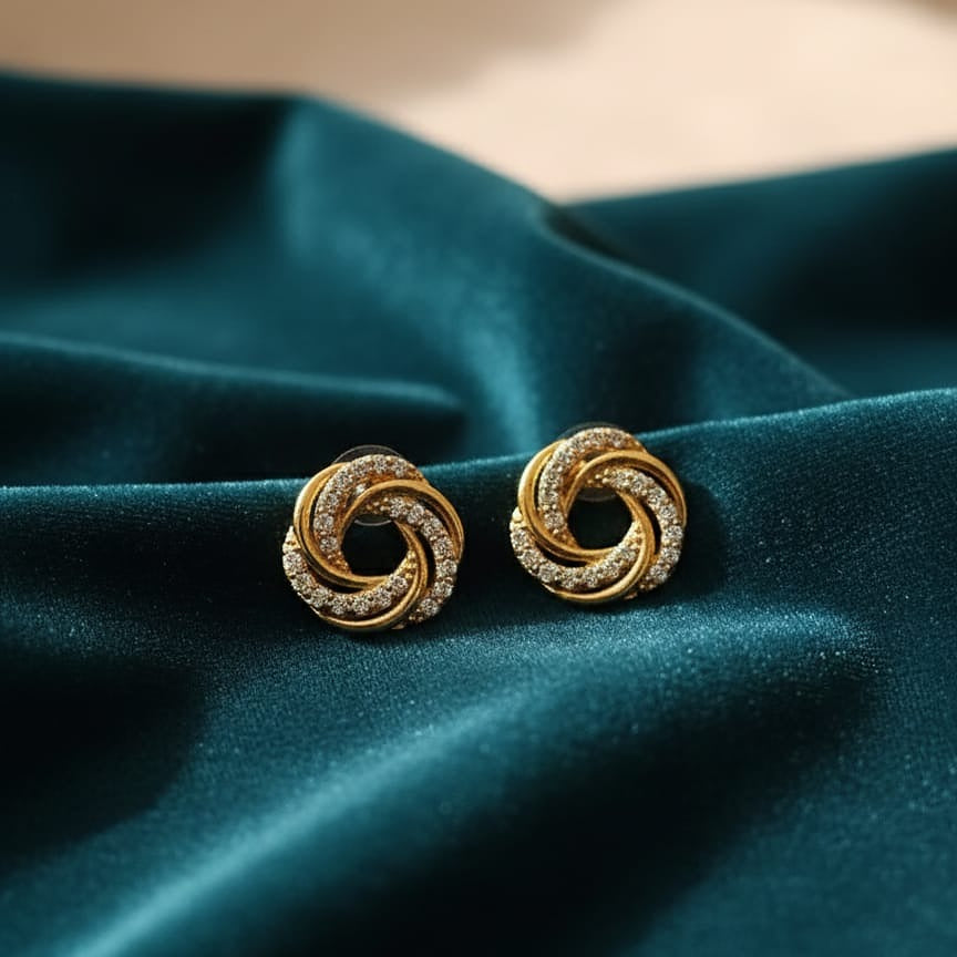 Gold earrings with diamond accents 