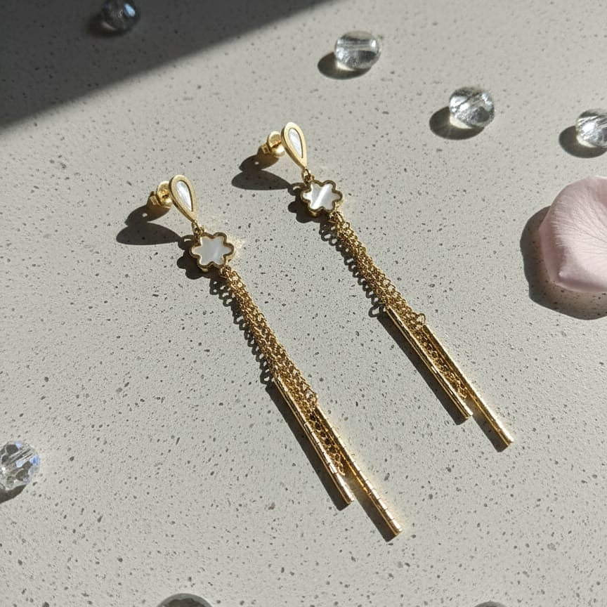 Gold earrings with floral tops