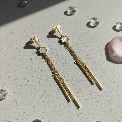 Gold earrings with floral tops
