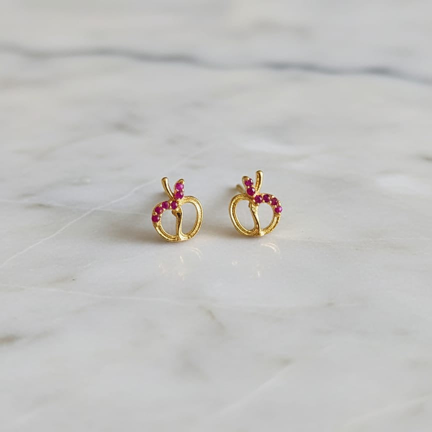 Gold earrings with pink gemstones
