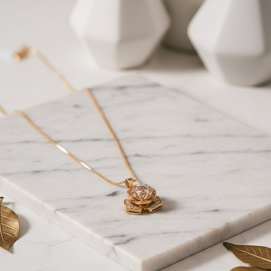 Gold necklace with a floral pendant