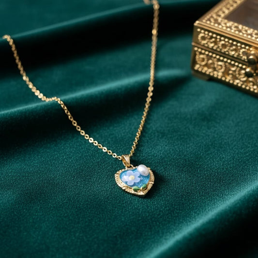 Gold necklace with a heart-shaped pendant