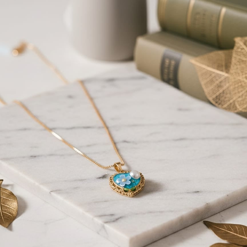 Gold necklace with a heart-shaped pendant 