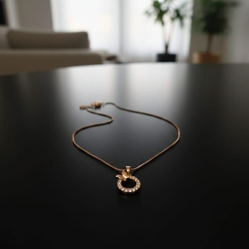 Gold necklace with a pendant