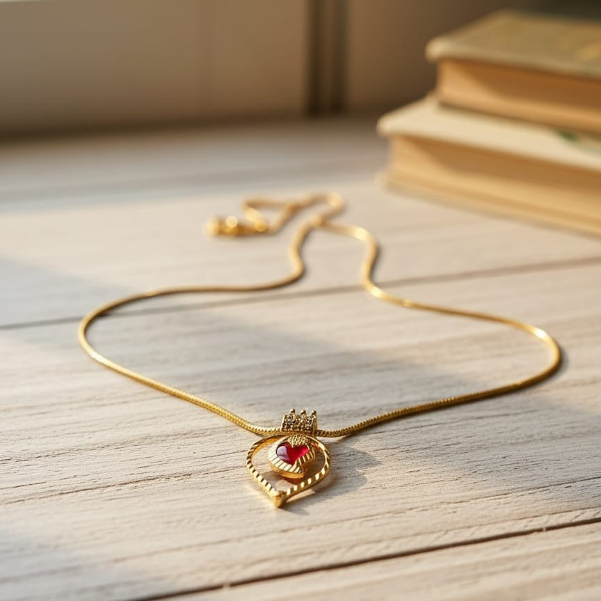 Gold necklace with a heart-shaped pendant