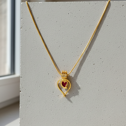 Gold necklace with a heart-shaped pendant