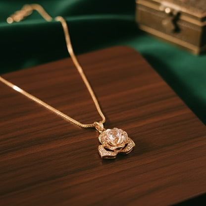 Gold necklace with a rose-shaped pendant 