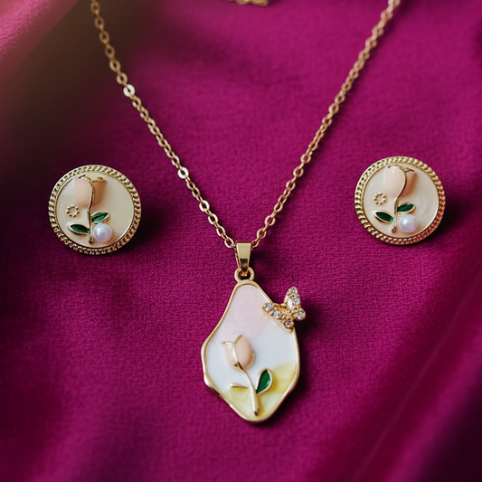 Gold necklace with pendant and matching earrings