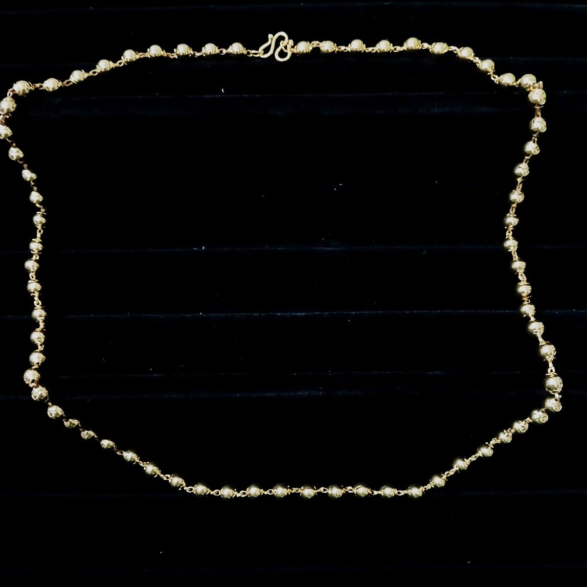 Gold necklace with small beads