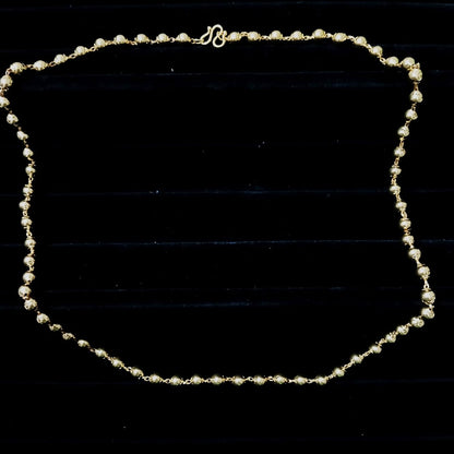 Gold necklace with small beads