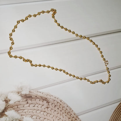 Gold necklace with small beads