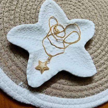 Gold star necklace 