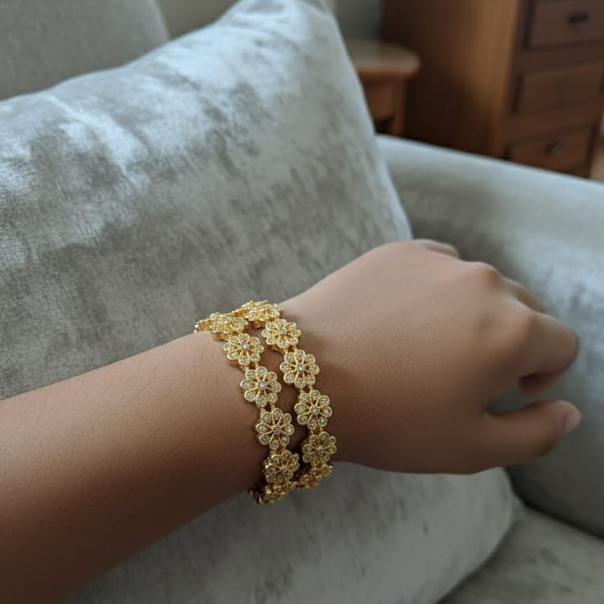 Gold bracelet on a wrist  