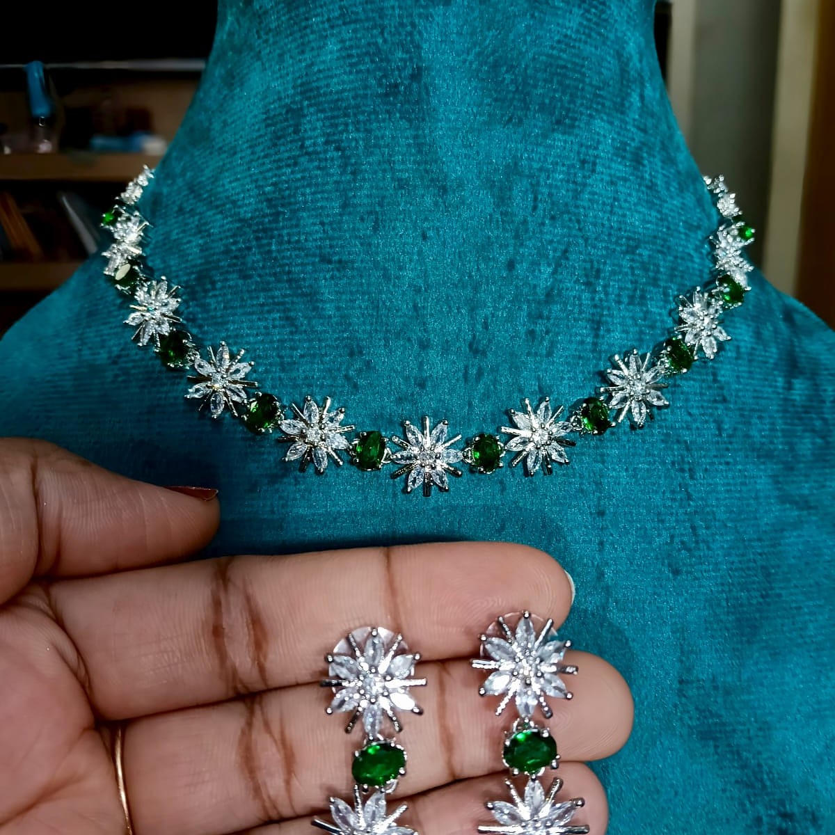 Necklace and earrings with green and clear stones 