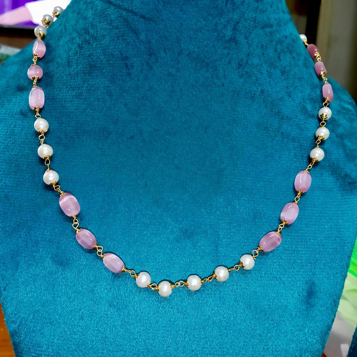 Necklace with pink and white beads