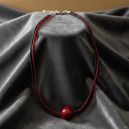 Necklace with red and black beads