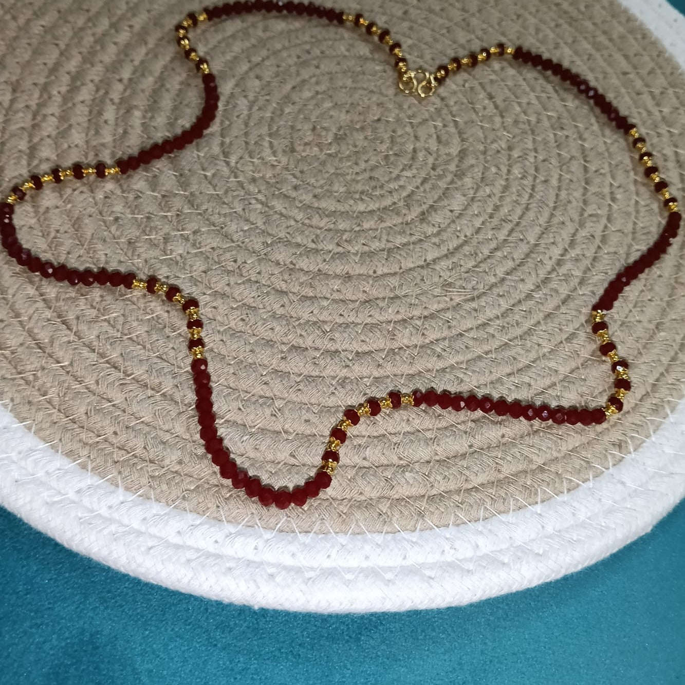 Necklace with red and gold beads