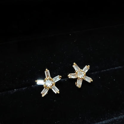 Gold star-shaped earrings 