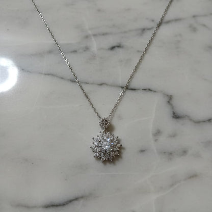 Silver necklace with a star-shaped pendant 
