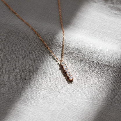 Rose gold necklace with a bar pendant 