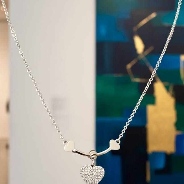 Silver necklace with heart pendants 