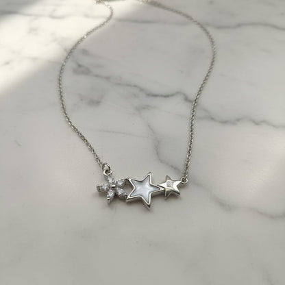 Silver necklace with star-shaped pendants 