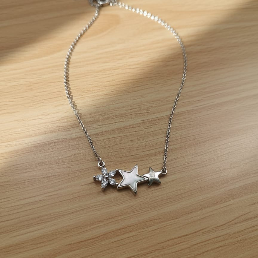 Silver necklace with star pendants