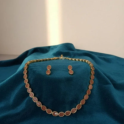 Gold necklace and earrings