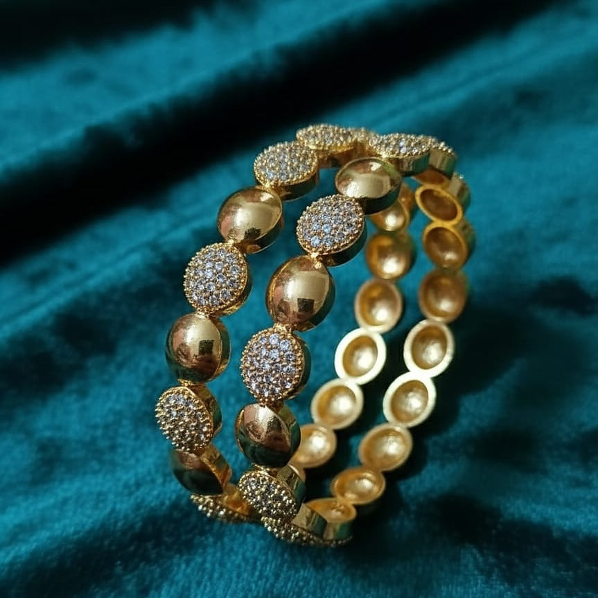 Sparkling CZ Pave & High-Shine Gold Bangle