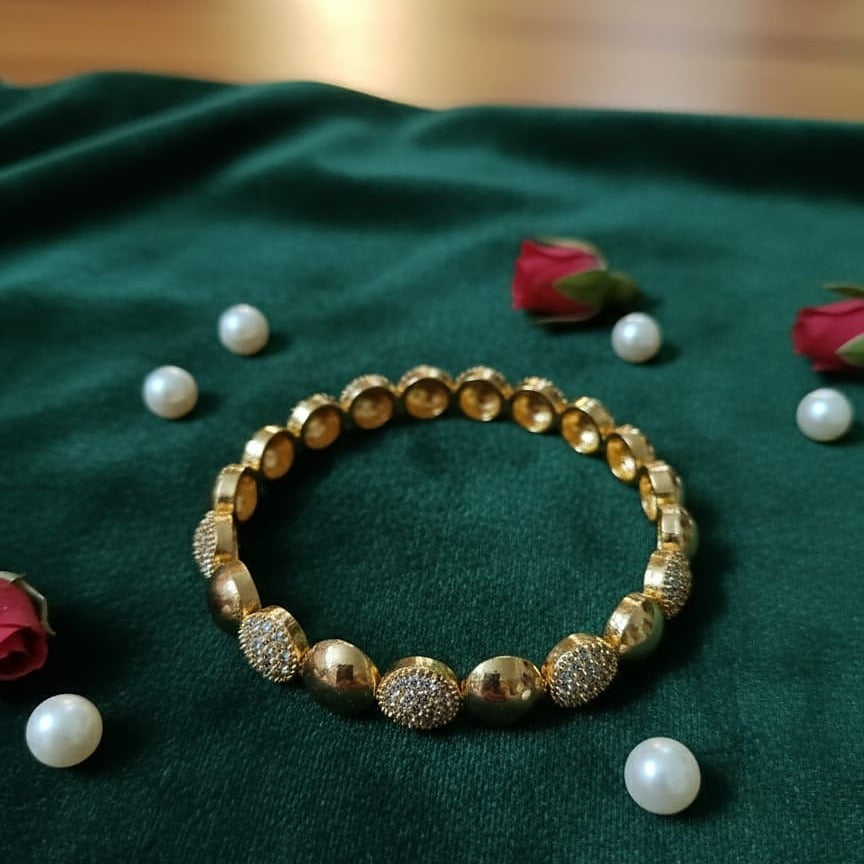 Sparkling CZ Pave & High-Shine Gold Bangle