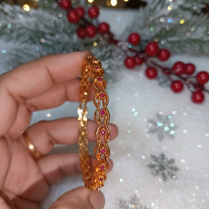 Traditional Gold-Toned Bangle with Ruby-Red Leaf/Heart Motifs
